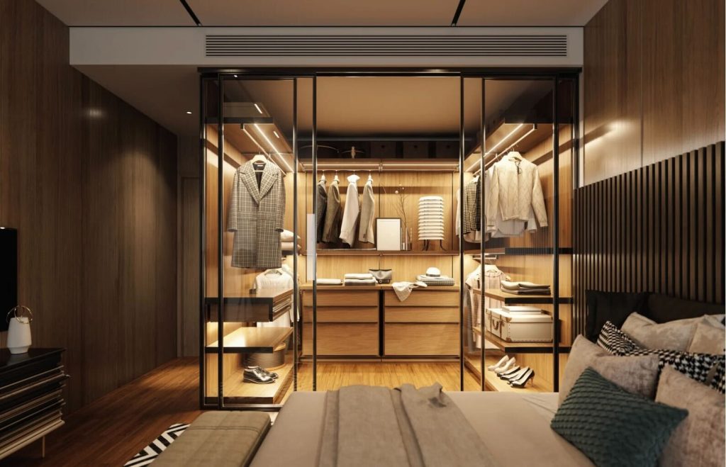 木目と間接照明で統一された高級感のあるクローゼット。服を選ぶことが楽しみになる空間。