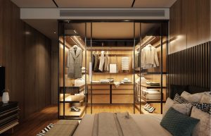 木目と間接照明で統一された高級感のあるクローゼット。服を選ぶことが楽しみになる空間。