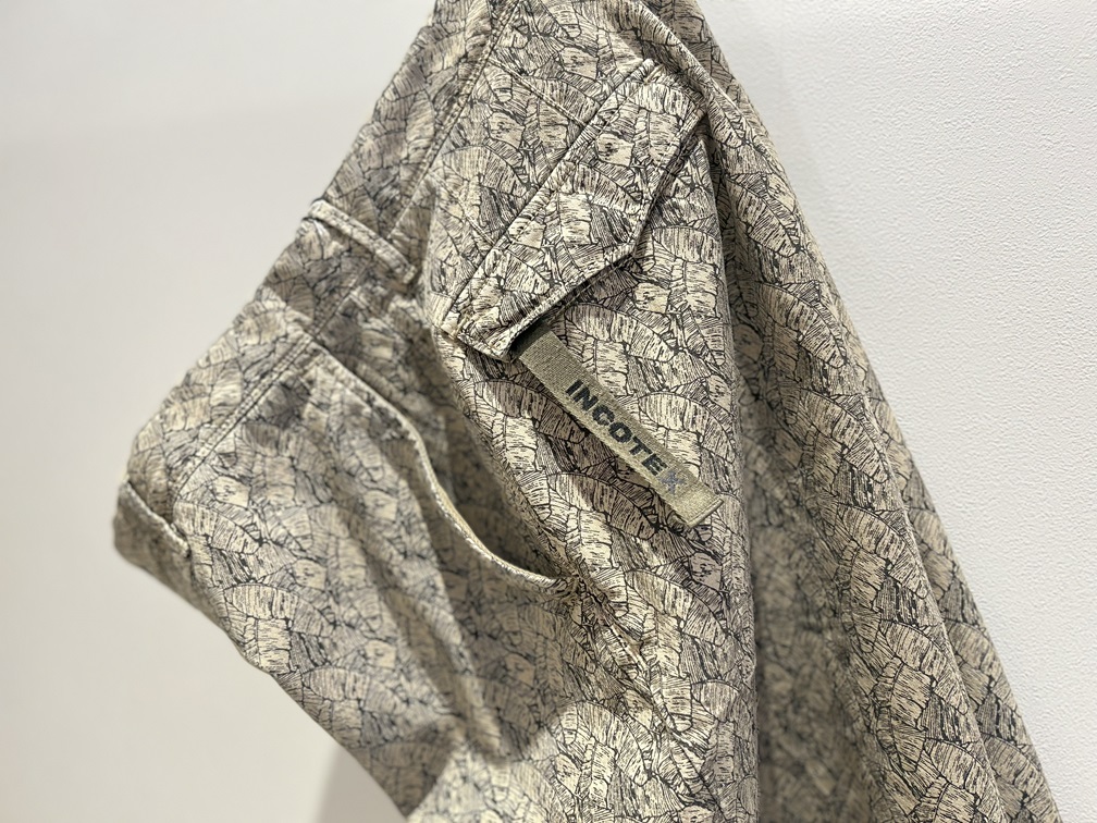 INCOTEXショートパンツのブランドタグとメタルプレートのディテール