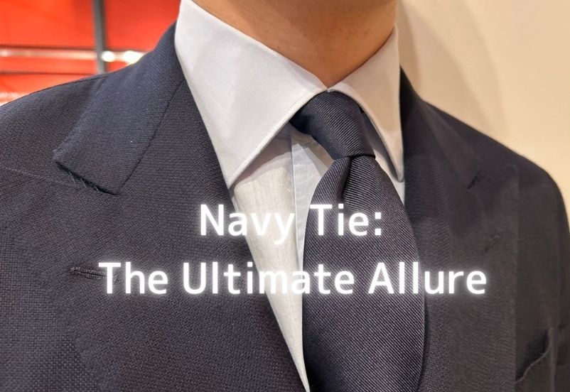 ネイビータイが与える誠実で落ち着いた印象のVゾーンクローズアップ